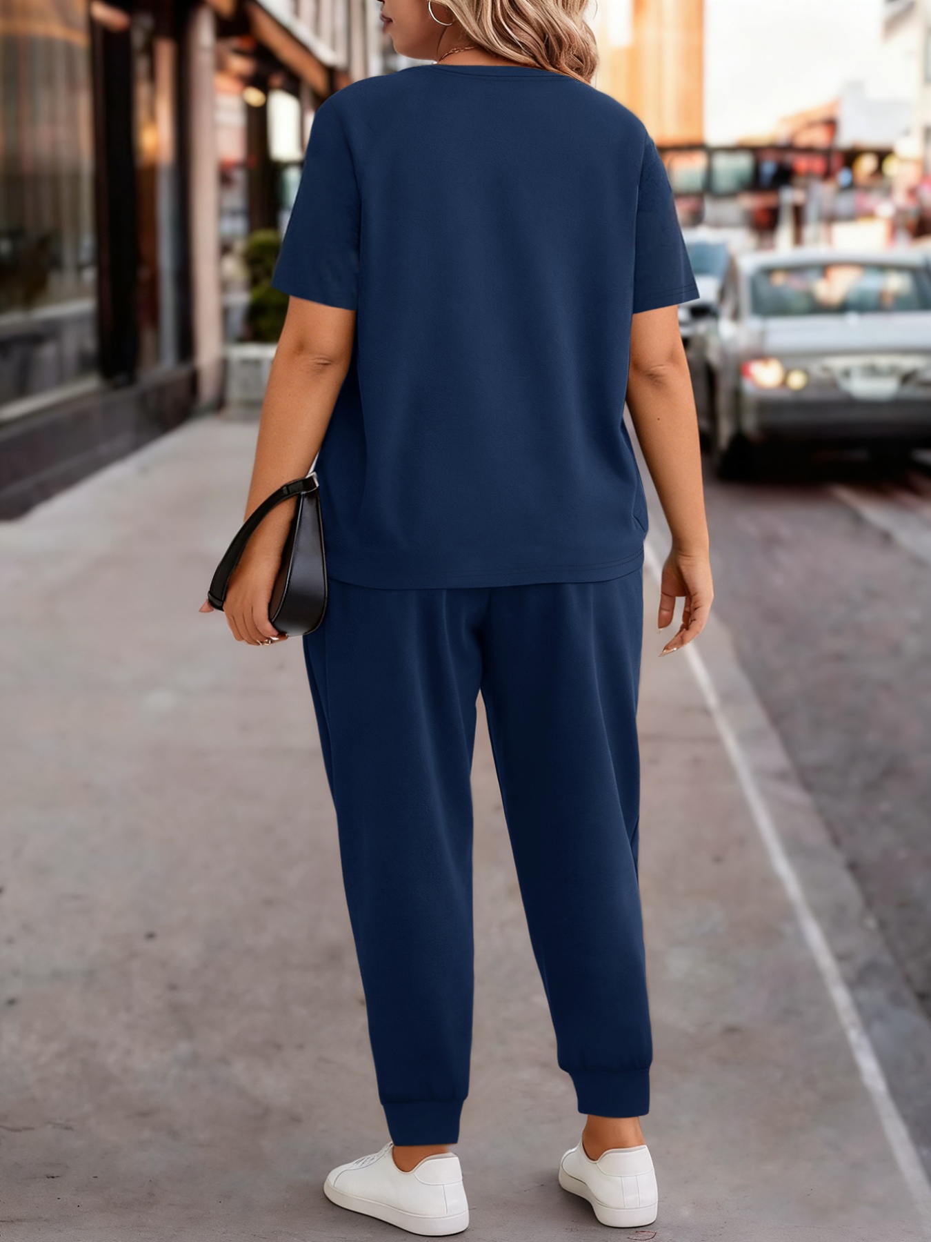 ensemble de détente 2 pièces pour femme grande taille, t shirt et jogging doux à élasticité moyenne avec cordons de serrage et poches, imprimé graphique, style décontracté idéal pour le printemps et l'été ensemble de détente 2 pièces pour femme grande taille, t shirt et jogging doux à élasticité moyenne avec cordons de serrage et poches, imprimé graphique, style décontracté idéal pour le printemps et l'été