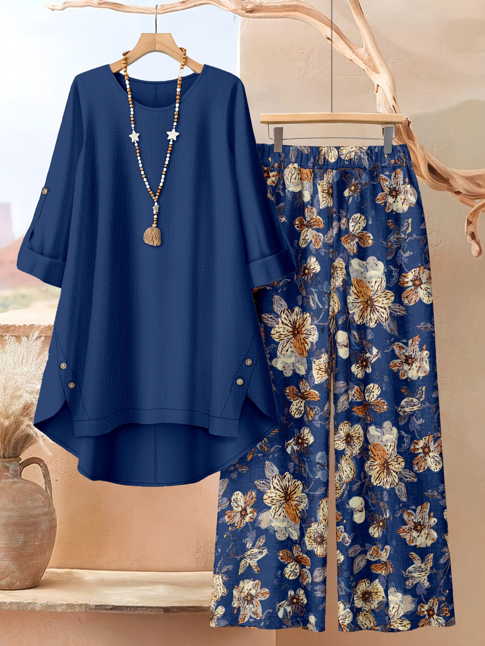 ensemble 2 pièces grande taille : haut uni à ourlet irrégulier et pantalon à imprimé floral, élégance au quotidien ensemble 2 pièces grande taille : haut uni à ourlet irrégulier et pantalon à imprimé floral, élégance au quotidien
